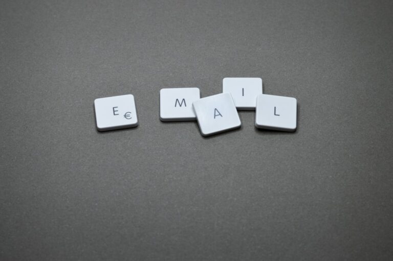 The word "email" is spelled out with letter tiles.